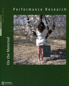 Front cover of the journal Performance Research, On the maternal edition. Image on cover of a woman standing in a